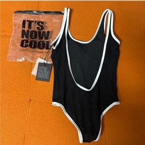 The backless duo one piece by it’s now cool